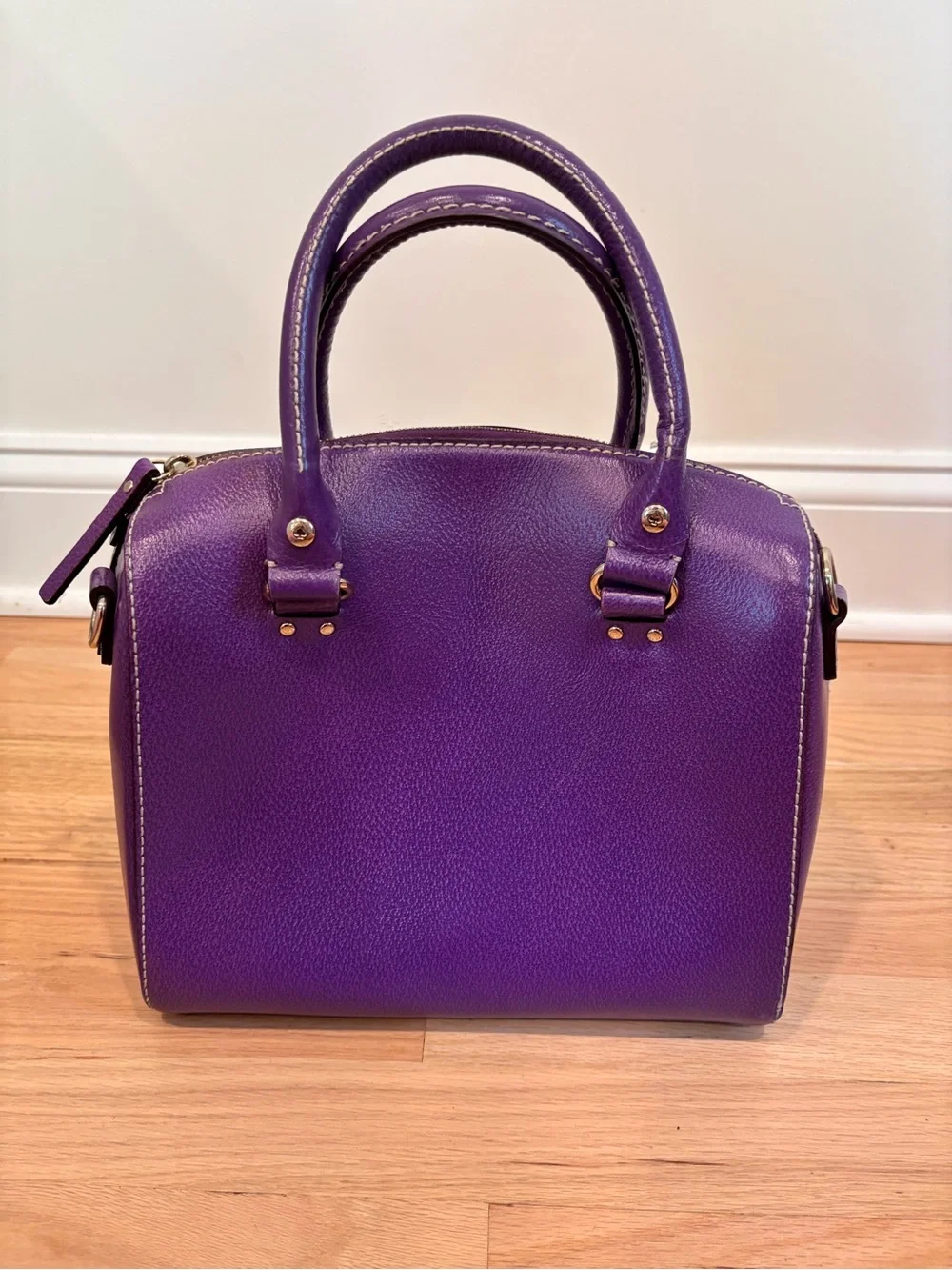 Kate Spade Alessa Wellesley handbag in a vibrant plumberry purple leather